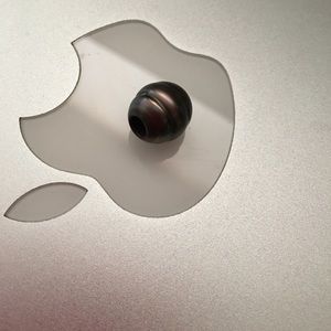 Authentic Jamaican Black Pearl charm.